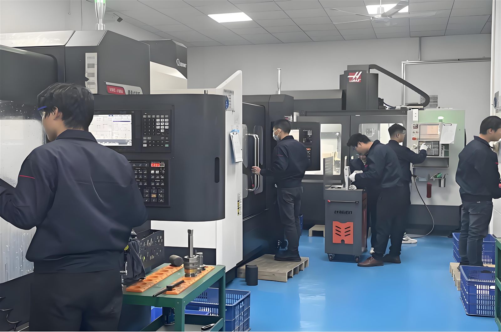 Operators working on CNC machining centers